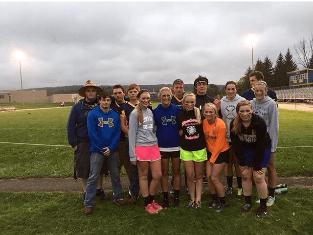 EHS students enjoy playing powder puff football before the bonfire