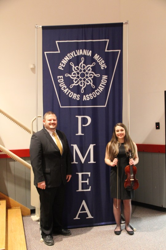 Senior, Kayla Kuppertz, and director, Mr. Napolitan, attend PMEA District Orchestra Festival in Meadville, PA.